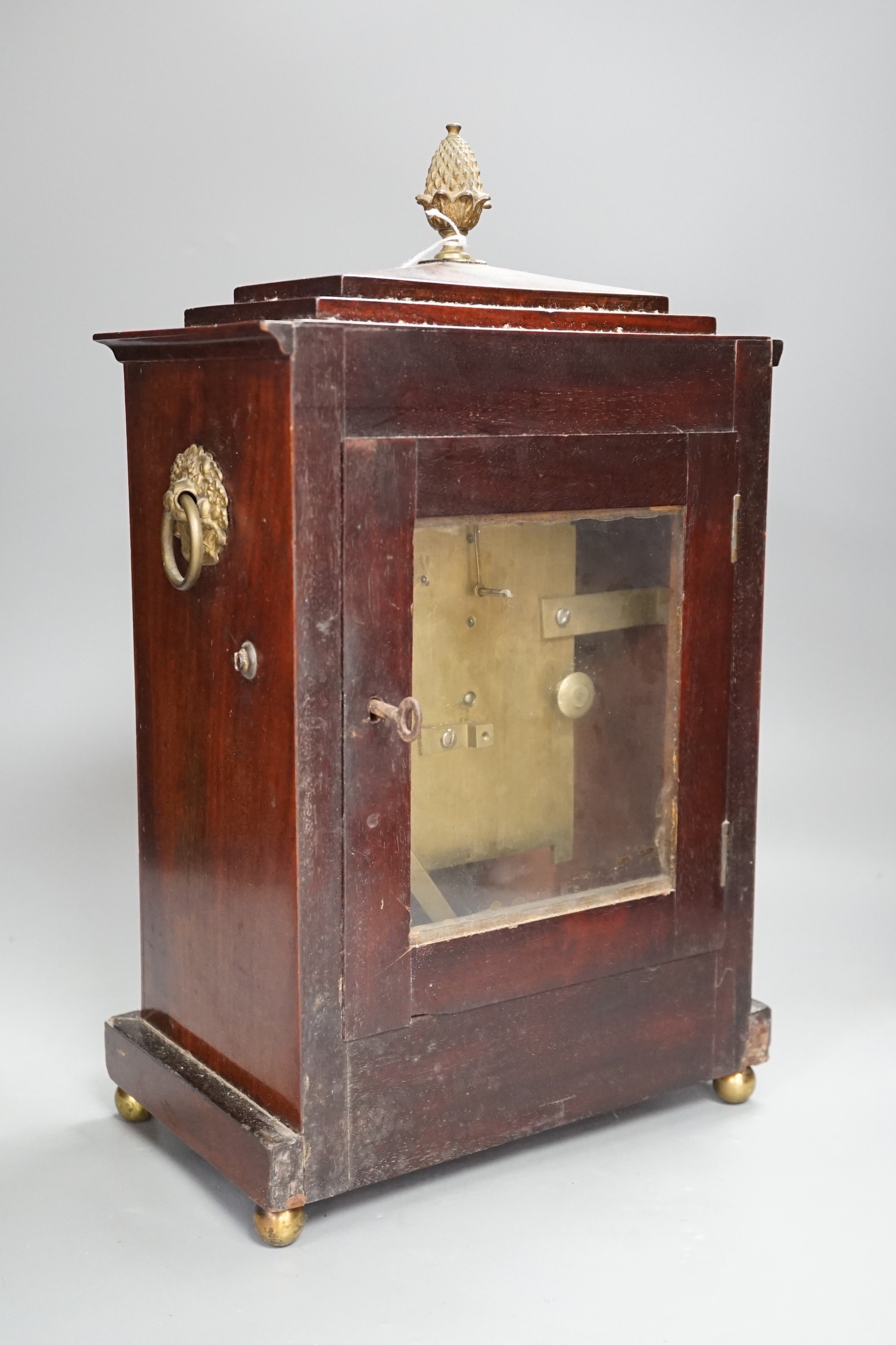 A Regency brass inset mahogany mantel timepiece, 39cm high